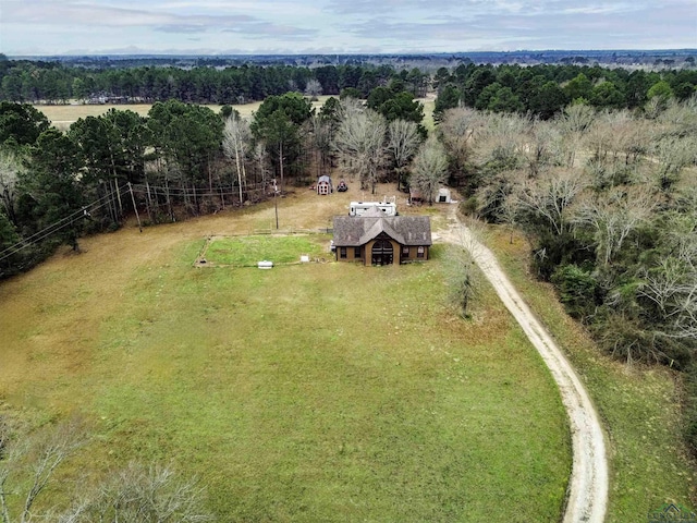 bird's eye view with a view of trees