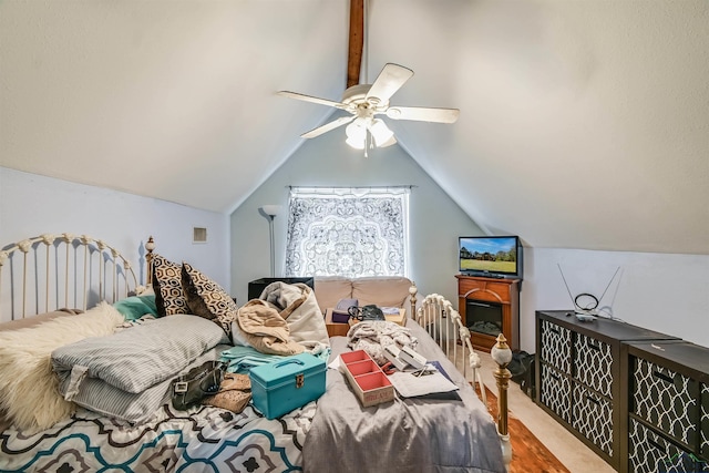 bedroom featuring vaulted ceiling, ceiling fan, and visible vents