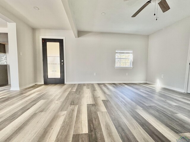 68 Eason Ln, Atlanta, TX 75551 - spare room with baseboards, ceiling fan, and wood finished floors