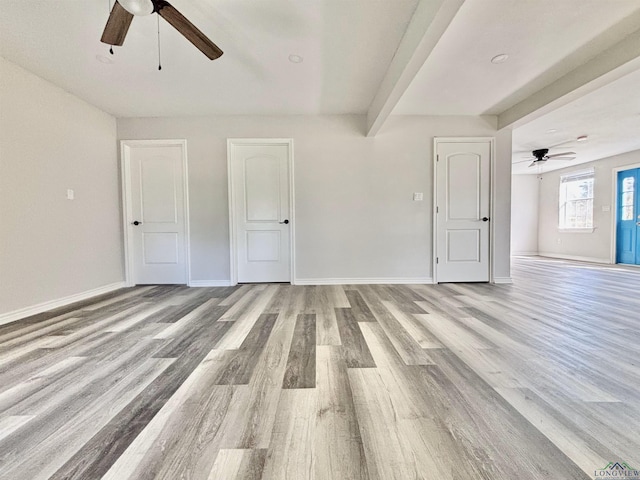 68 Eason Ln, Atlanta, TX 75551 - empty room with baseboards, light wood-style flooring, and a ceiling fan