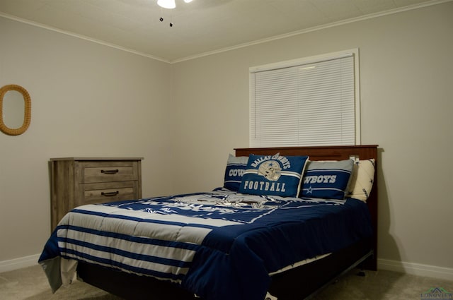 105 W Highland Ave, Longview, TX 75602 - carpeted bedroom featuring baseboards, ornamental molding, and ceiling fan