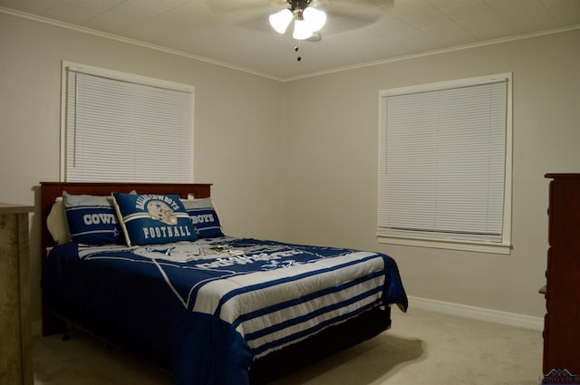105 W Highland Ave, Longview, TX 75602 - bedroom with ornamental molding, carpet, baseboards, and a ceiling fan