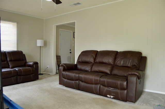 105 W Highland Ave, Longview, TX 75602 - living area with carpet floors, ceiling fan, baseboards, and ornamental molding