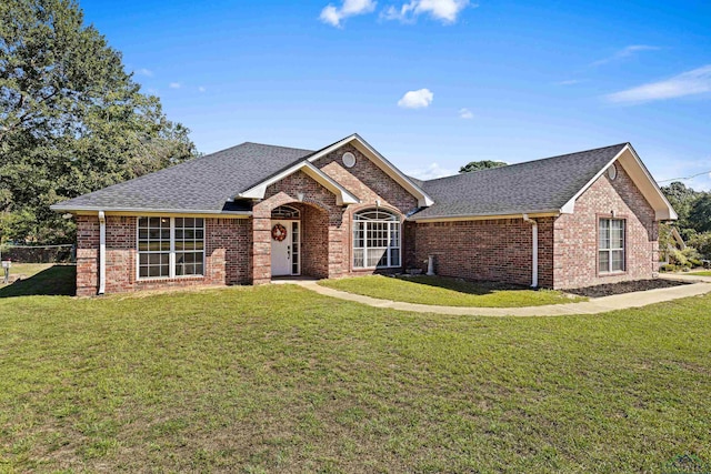 view of front of property with a front lawn