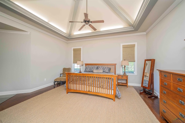 108 Fountainebleau Ave, Longview, TX 75605 - bedroom with wood finished floors, ornamental molding, vaulted ceiling, baseboards, and ceiling fan