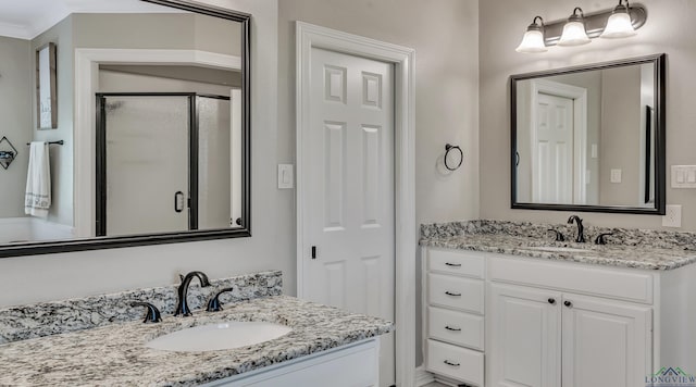 4300 Willow Bnd, Longview, TX 75602 - bathroom featuring a stall shower and two vanities
