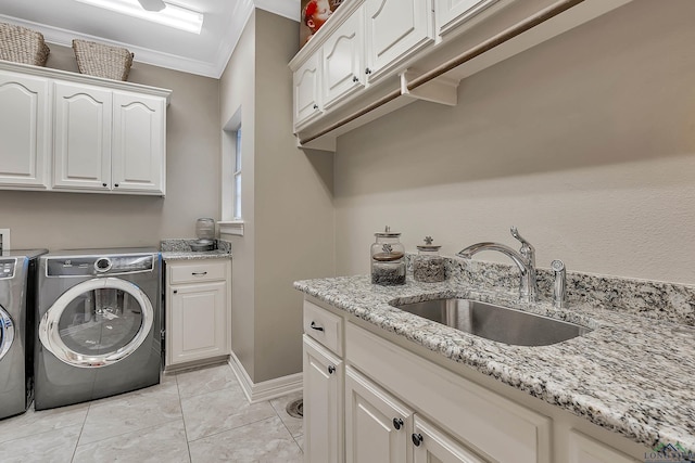 4300 Willow Bnd, Longview, TX 75602 - washroom with cabinet space, independent washer and dryer, ornamental molding, and baseboards