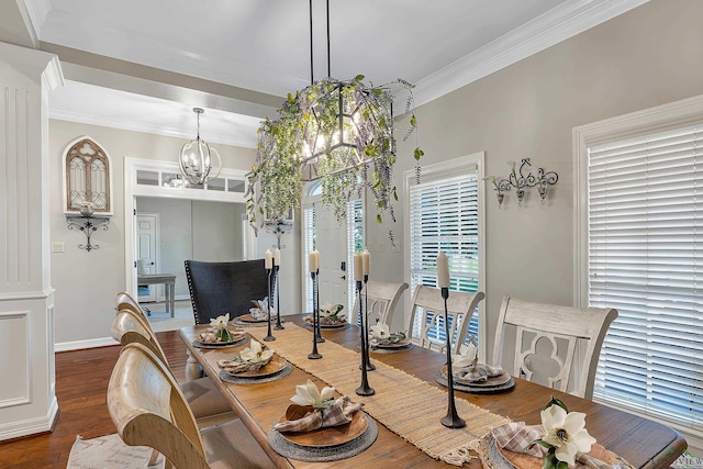 4300 Willow Bnd, Longview, TX 75602 - dining room featuring dark wood-style flooring, ornamental molding, a chandelier, and baseboards