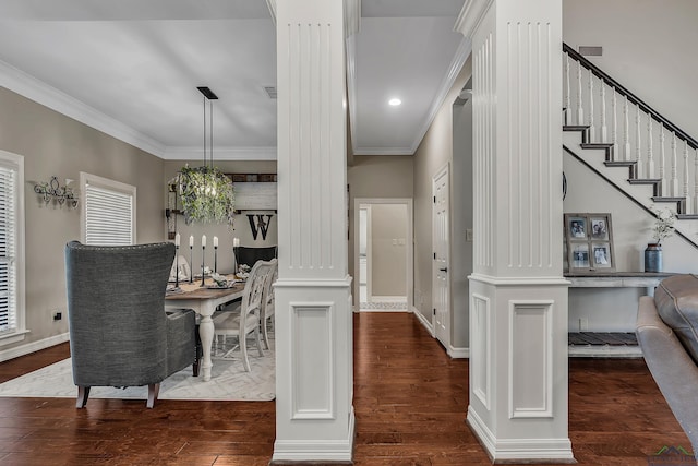 4300 Willow Bnd, Longview, TX 75602 - dining room featuring ornate columns, wood finished floors, crown molding, baseboards, and stairway