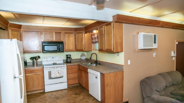 kitchen with sink, a wall unit AC, and white appliances