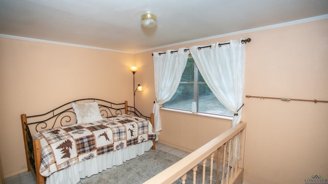 bedroom featuring ornamental molding and multiple windows