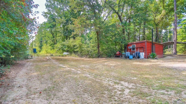 view of yard featuring a carport