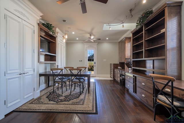 dining space with ceiling fan, crown molding, and dark wood-type flooring