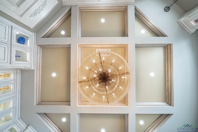 interior details featuring a notable chandelier