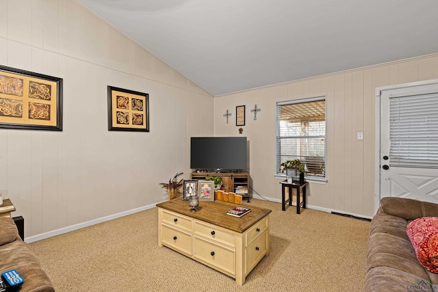 living room with lofted ceiling and light colored carpet