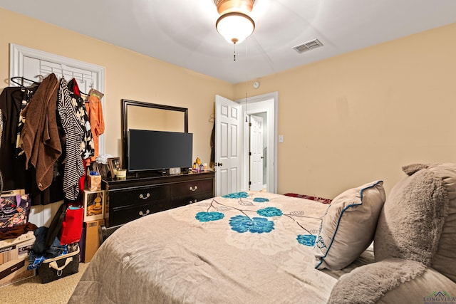 bedroom featuring ceiling fan and carpet flooring