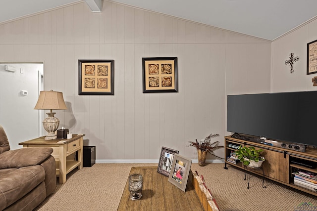 carpeted living room featuring lofted ceiling