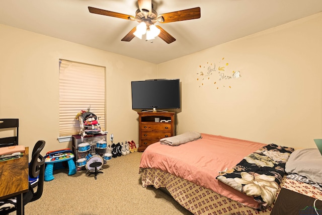 bedroom featuring ceiling fan and carpet flooring