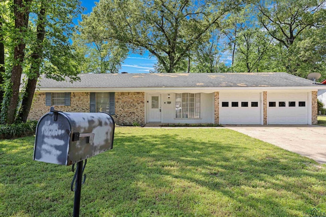ranch-style house featuring concrete driveway, brick siding, a front yard, and a garage