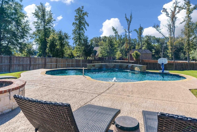 view of swimming pool featuring a patio area, a fenced backyard, and a fenced in pool