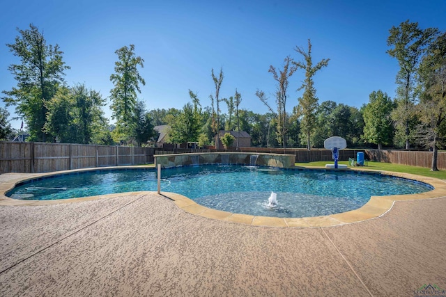 view of pool with a fenced in pool, a fenced backyard, and a patio