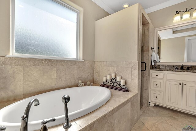 bathroom featuring vanity, a shower with shower door, and crown molding