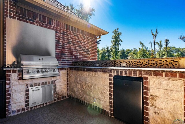 view of patio featuring a grill and area for grilling