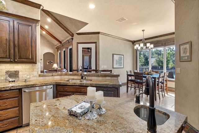 kitchen with dishwasher, sink, lofted ceiling with beams, backsplash, and a chandelier