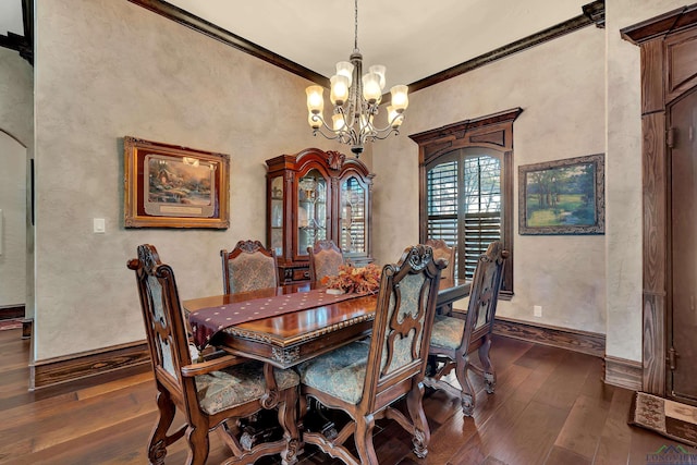 dining room featuring baseboards, a notable chandelier, dark wood finished floors, and crown molding