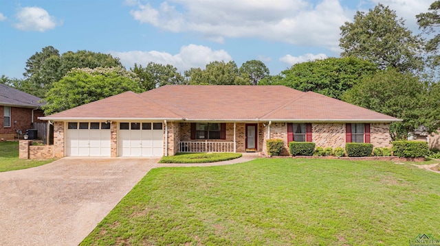 3714 Bill Owens Pkwy, Longview, TX 75605 - single story home with an attached garage, covered porch, a front lawn, and driveway