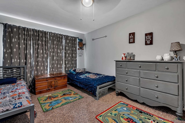 carpeted bedroom with a ceiling fan