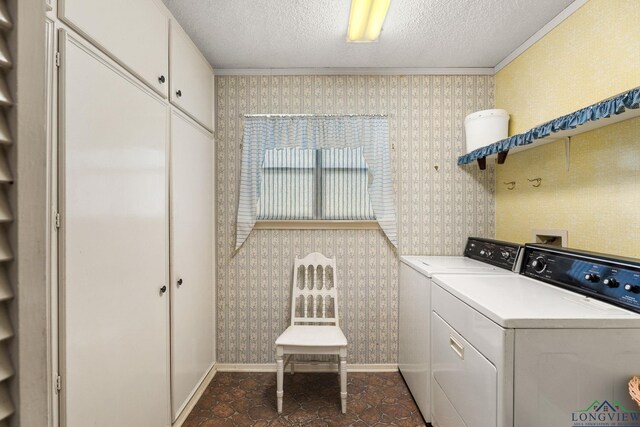 6940 Fm 778, Hawkins, TX 75765 - clothes washing area with wallpapered walls, washer and clothes dryer, cabinet space, a textured ceiling, and baseboards