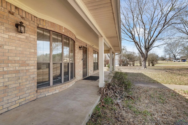 view of patio featuring a porch