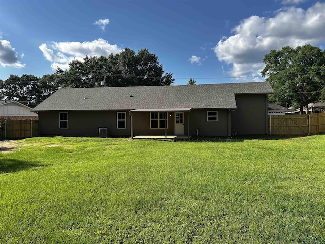 115 Alta St, Longview, TX 75604 - back of property with roof with shingles and central AC unit