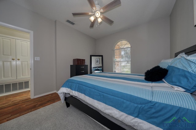 bedroom with dark wood-type flooring and ceiling fan