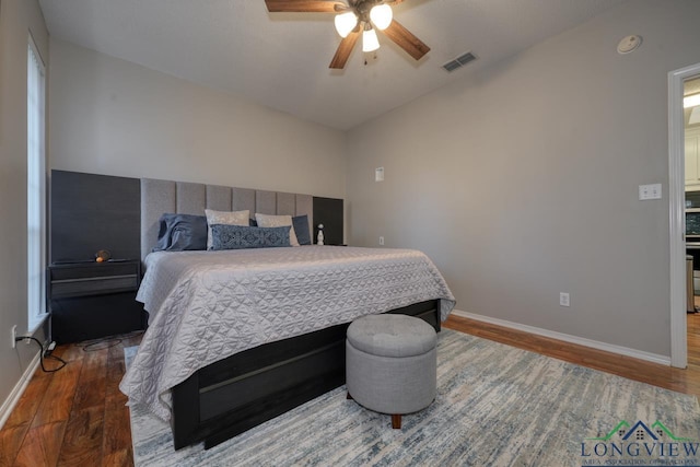 bedroom featuring ceiling fan and wood-type flooring