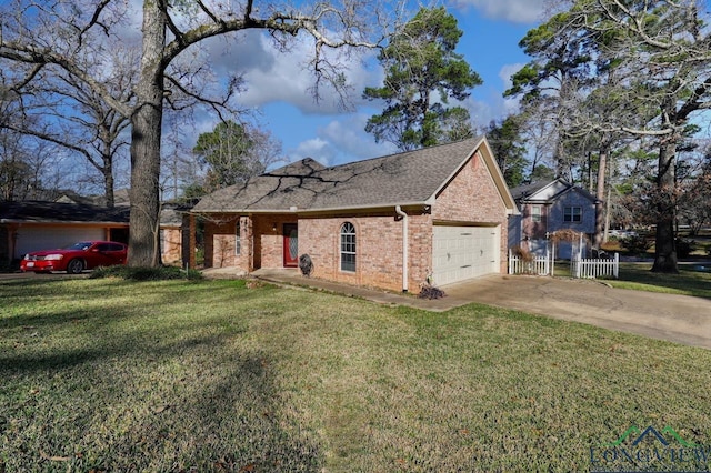 view of front of home with a garage and a front lawn