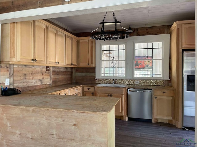 kitchen featuring appliances with stainless steel finishes, light brown cabinets, and sink