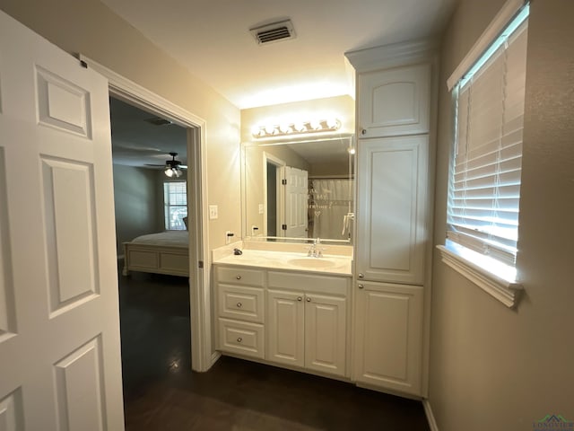 bathroom featuring ceiling fan and vanity