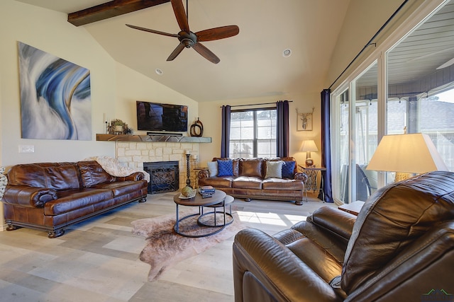 5112 Remington St, Texarkana, TX 75503 - living room featuring ceiling fan, beamed ceiling, a stone fireplace, light wood-type flooring, and high vaulted ceiling