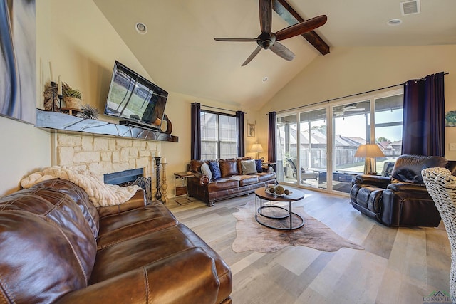 5112 Remington St, Texarkana, TX 75503 - living area with ceiling fan, beam ceiling, wood finished floors, a fireplace, and recessed lighting