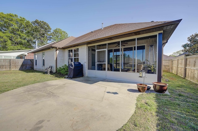 5112 Remington St, Texarkana, TX 75503 - back of property featuring ceiling fan, a patio area, a sunroom, and roof with shingles