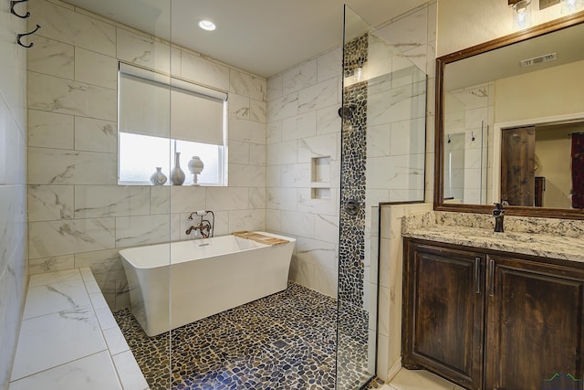 5112 Remington St, Texarkana, TX 75503 - full bathroom with a soaking tub, vanity, marble look tiles, and recessed lighting