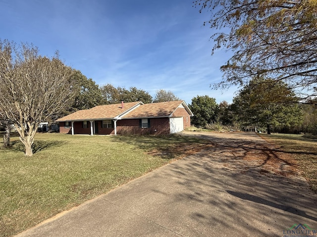 view of front of property with a front lawn