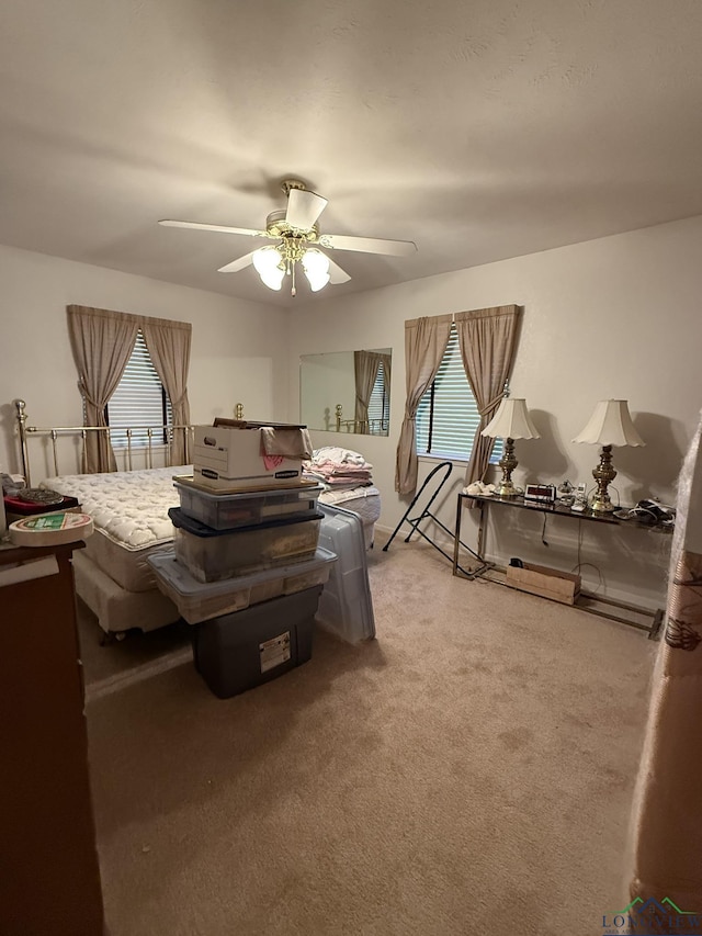 bedroom with carpet and ceiling fan