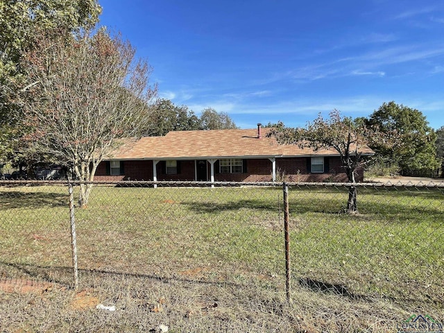 ranch-style house with a front yard