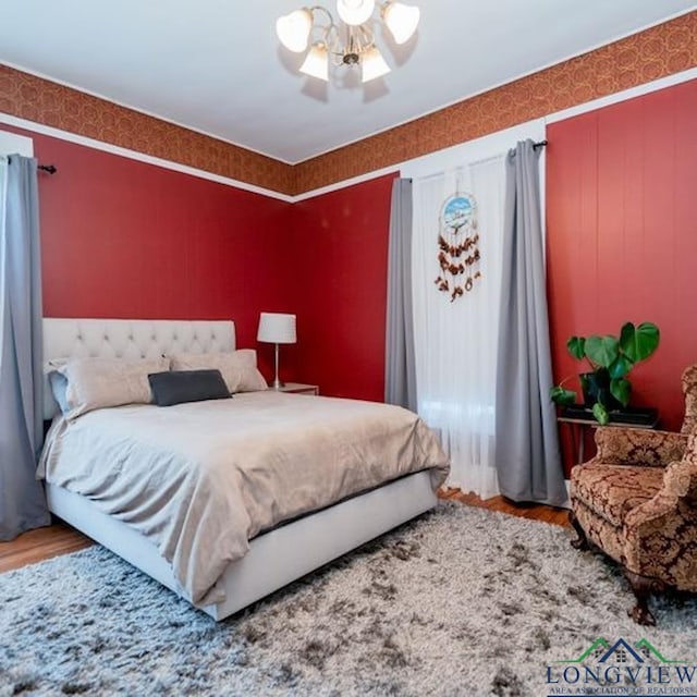 bedroom featuring wood-type flooring