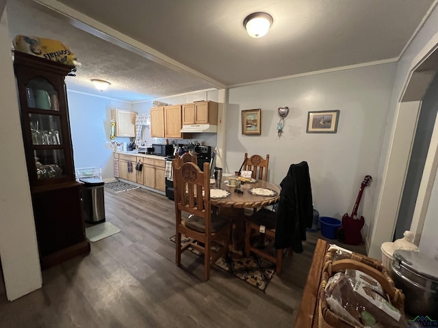 dining room featuring a textured ceiling, dark hardwood / wood-style flooring, and ornamental molding