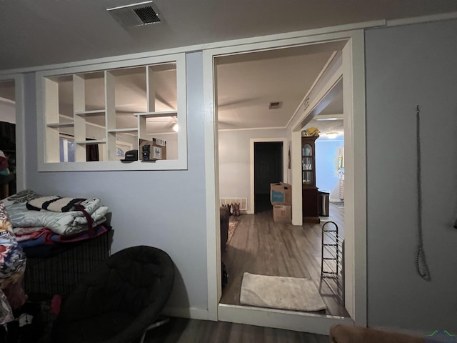 bedroom with hardwood / wood-style flooring