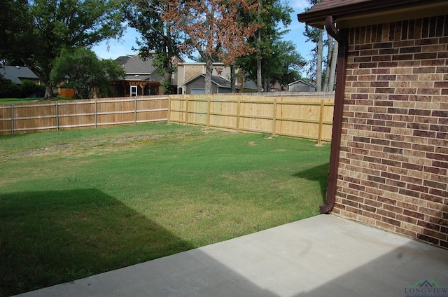 view of yard with a patio area